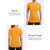 image:imageRoadbox Womens Compression Shirt Slim Fit Short Sleeve Athletic Top Workout Undershirt for Gym and YogaOrange